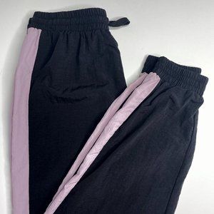 BLACK TRACK PARNTS WITH PURPLE SIDE STRIPE